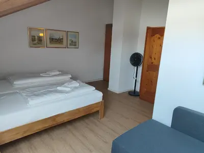 Ein Bett oder Betten in einem Zimmer der Unterkunft Estelada Boarding Houses Zorneding