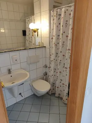 Ein Badezimmer in der Unterkunft Estelada Boarding Houses Zorneding