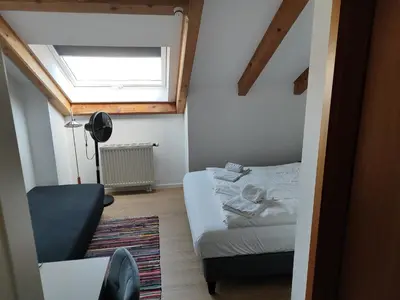 Ein Bett oder Betten in einem Zimmer der Unterkunft Estelada Boarding Houses Zorneding