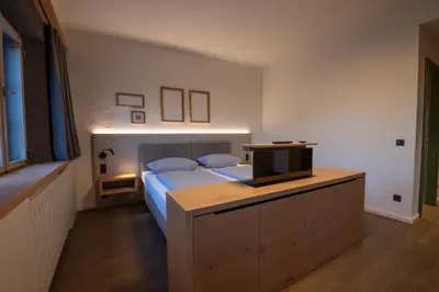 Ein Bett oder Betten in einem Zimmer der Unterkunft LANDHOTEL ALTE ZOLLSTATION- Historical Building