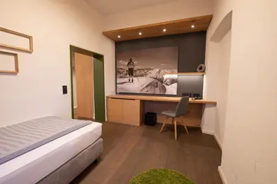 Ein Bett oder Betten in einem Zimmer der Unterkunft LANDHOTEL ALTE ZOLLSTATION- Historical Building