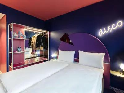 Ein Bett oder Betten in einem Zimmer der Unterkunft ibis Styles Muenchen Perlach