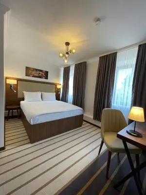 Ein Bett oder Betten in einem Zimmer der Unterkunft Hotel Casa Andalucia