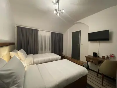 Ein Bett oder Betten in einem Zimmer der Unterkunft Hotel Casa Andalucia