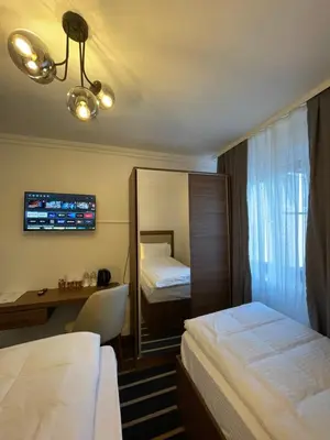 Ein Bett oder Betten in einem Zimmer der Unterkunft Hotel Casa Andalucia