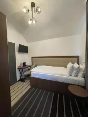 Ein Bett oder Betten in einem Zimmer der Unterkunft Hotel Casa Andalucia