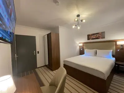 Ein Bett oder Betten in einem Zimmer der Unterkunft Hotel Casa Andalucia