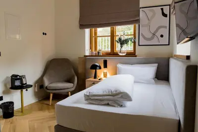 Ein Bett oder Betten in einem Zimmer der Unterkunft Bob W Munich Airport - Peterhof