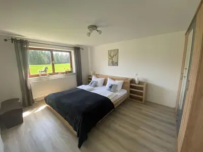Ein Bett oder Betten in einem Zimmer der Unterkunft Ferienhof Steingaden