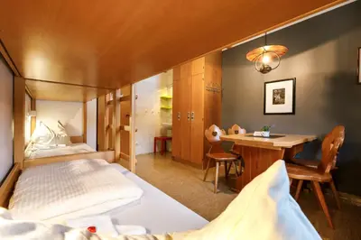 Ein Bett oder Betten in einem Zimmer der Unterkunft Jugendherberge Kreuth am Tegernsee