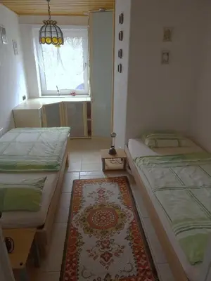 Ein Bett oder Betten in einem Zimmer der Unterkunft Fewo Sabrina EG & OG