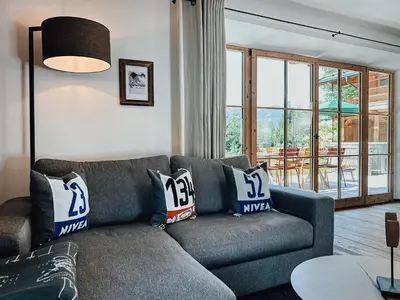 Ein Sitzbereich in der Unterkunft Chalet Nordic mit privatem Whirlpool und Sauna