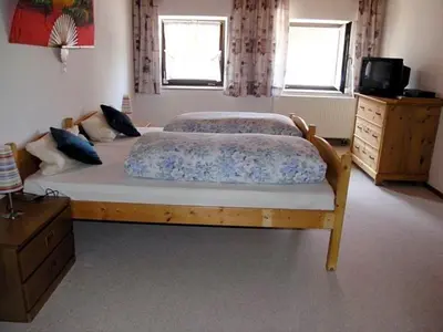 Ein Bett oder Betten in einem Zimmer der Unterkunft Ferienhaus, Bauernhof mit Angel- und Badesee, Roßhaupten, Allgäu