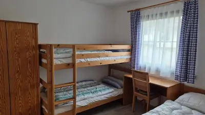 Ein Bett oder Betten in einem Zimmer der Unterkunft Ferienhaus Nr 91, Typ A, Feriendorf Hochbergle, Allgäu