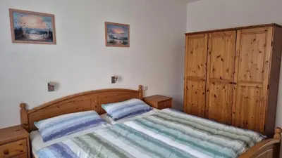 Ein Bett oder Betten in einem Zimmer der Unterkunft Ferienhaus Nr 91, Typ A, Feriendorf Hochbergle, Allgäu