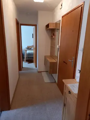 Ein Bett oder Betten in einem Zimmer der Unterkunft Ferienwohnung Bayrischzell