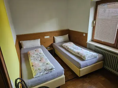 Ein Bett oder Betten in einem Zimmer der Unterkunft Appartement Bergblick