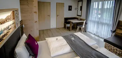 Ein Bett oder Betten in einem Zimmer der Unterkunft Pension Willibald