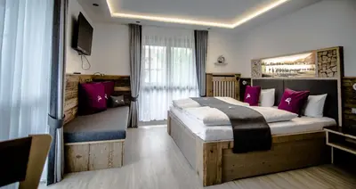 Ein Bett oder Betten in einem Zimmer der Unterkunft Pension Willibald
