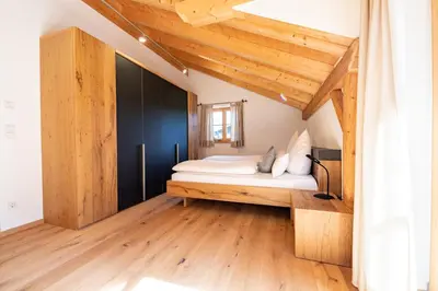 Ein Bett oder Betten in einem Zimmer der Unterkunft am Josefibrunnen