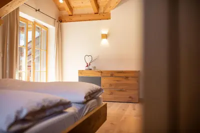 Ein Bett oder Betten in einem Zimmer der Unterkunft am Josefibrunnen