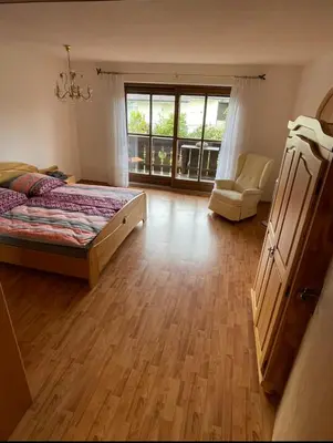 Ein Bett oder Betten in einem Zimmer der Unterkunft Ferienwohnung Wolf