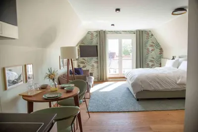 Ein Bett oder Betten in einem Zimmer der Unterkunft 21rooms
