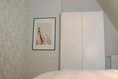 Ein Bett oder Betten in einem Zimmer der Unterkunft 21rooms