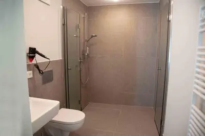 Ein Badezimmer in der Unterkunft 21rooms