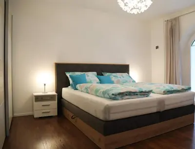 Ein Bett oder Betten in einem Zimmer der Unterkunft Ferienwohnung Gipfelglück