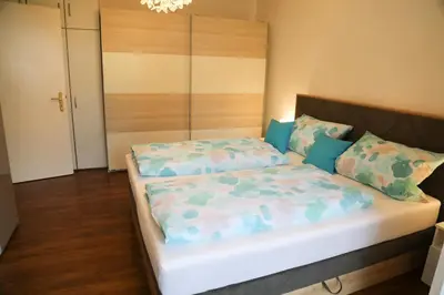 Ein Bett oder Betten in einem Zimmer der Unterkunft Ferienwohnung Gipfelglück