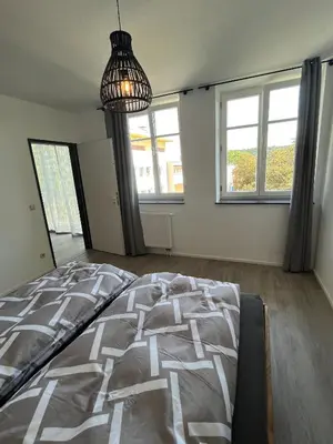 Ein Bett oder Betten in einem Zimmer der Unterkunft Altstadtwohnung - Old Town