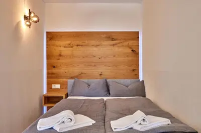 Ein Bett oder Betten in einem Zimmer der Unterkunft FeWo Alpenkate