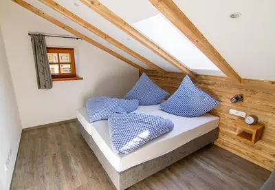 Ein Bett oder Betten in einem Zimmer der Unterkunft Ferienwohnung Leni