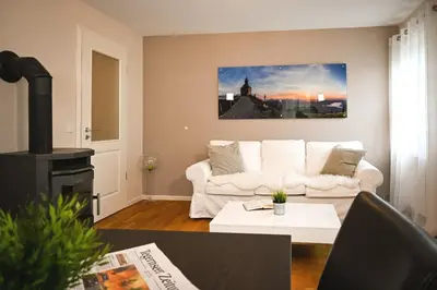 Ein Sitzbereich in der Unterkunft An der Freihaushöhe