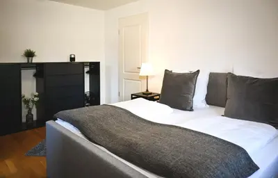 Ein Bett oder Betten in einem Zimmer der Unterkunft An der Freihaushöhe