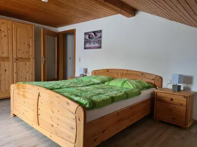 Ein Bett oder Betten in einem Zimmer der Unterkunft Ferienwohnung Huber am Deutensee