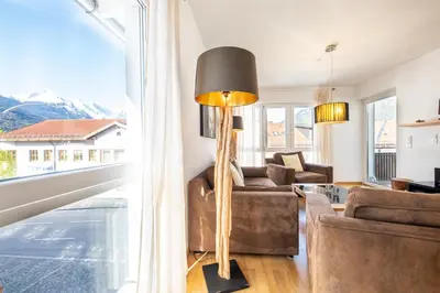 Ein Sitzbereich in der Unterkunft Alpenambiente