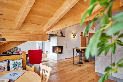 Ein Sitzbereich in der Unterkunft Chalet Wild