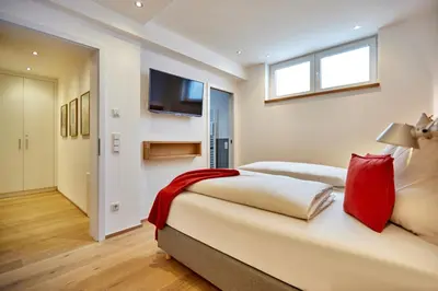 Ein Bett oder Betten in einem Zimmer der Unterkunft Murmeli