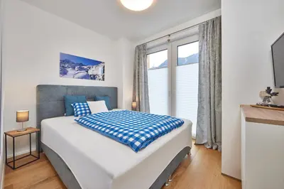 Ein Bett oder Betten in einem Zimmer der Unterkunft BergZeit