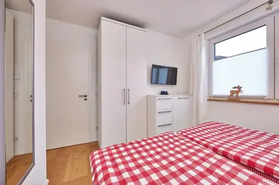 Ein Bett oder Betten in einem Zimmer der Unterkunft BergZeit