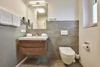 Ein Badezimmer in der Unterkunft BergZeit