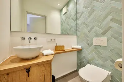 Ein Badezimmer in der Unterkunft Huettenzauber