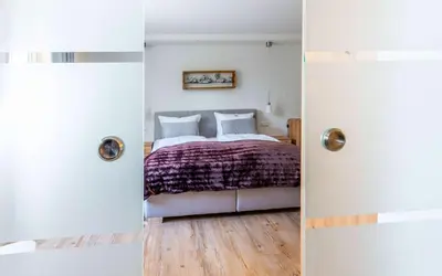 Ein Bett oder Betten in einem Zimmer der Unterkunft Ferienwohnung 