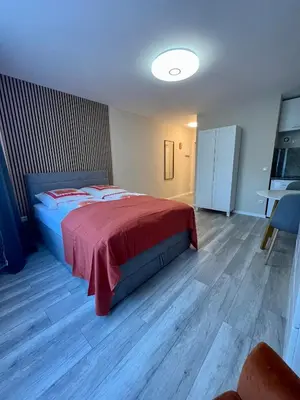 Ein Bett oder Betten in einem Zimmer der Unterkunft Apartment am Stadtbach by Aux Property