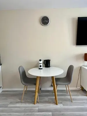 Ein Sitzbereich in der Unterkunft Apartment am Stadtbach by Aux Property