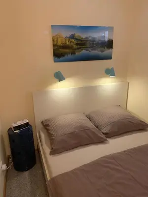 Ein Bett oder Betten in einem Zimmer der Unterkunft Ferienwohnung Mazur