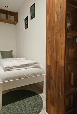 Ein Bett oder Betten in einem Zimmer der Unterkunft Panorama Home mit Weitblick auf die City
