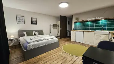 Ein Bett oder Betten in einem Zimmer der Unterkunft Panorama Home mit Weitblick auf die City